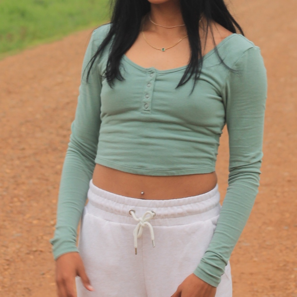 long sleeve crop top with silver buttons